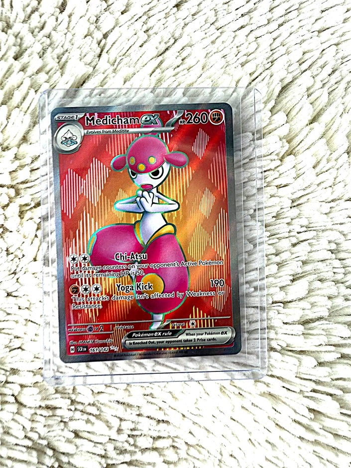 English Medicham ex featuring vibrant artwork and powerful Fighting-type