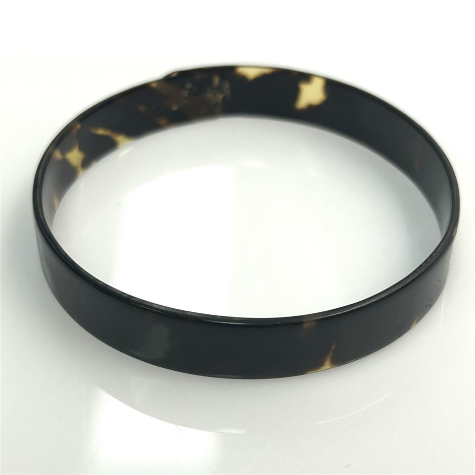 Polished tortoiseshell bracelet in rich brown and honey tones