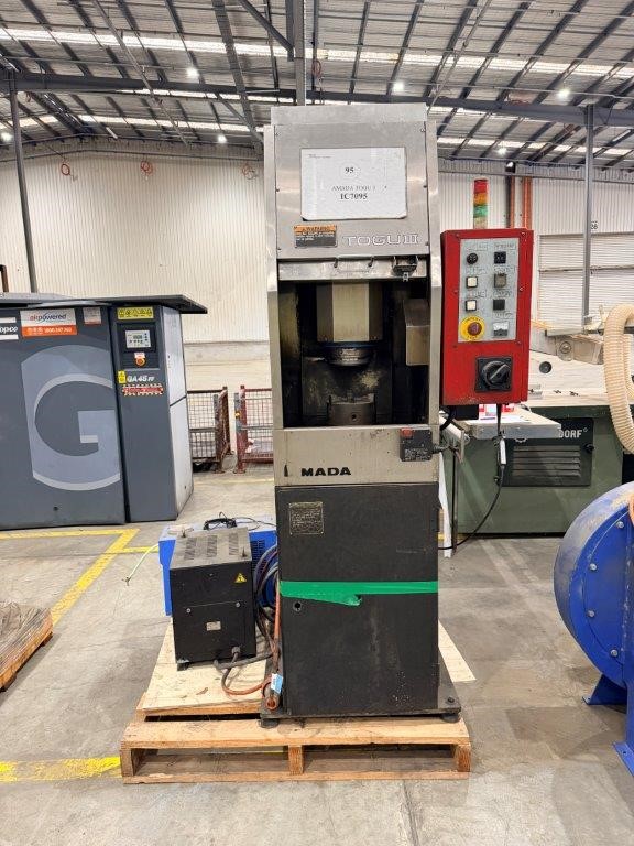 Amada Automatic Grounding Machine