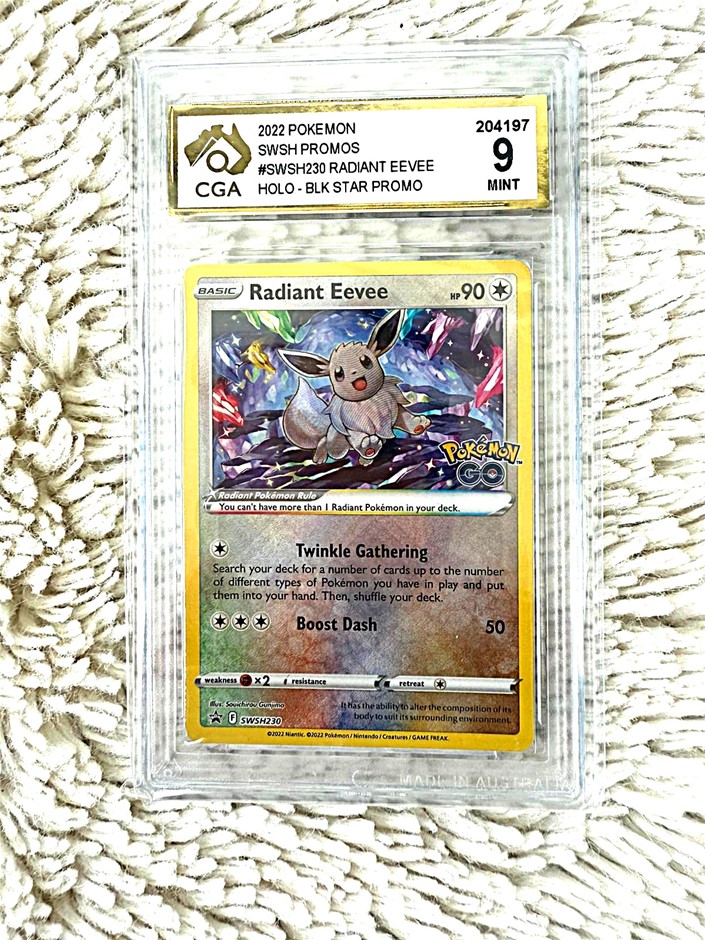 Radiant Eevee SWSH230 CGA 9 holo black star promo card.