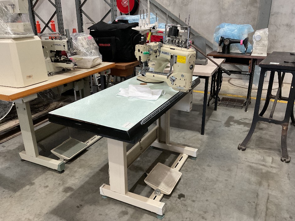 <p>Major Industrial Flatlock Seam Sewing Machine</p>