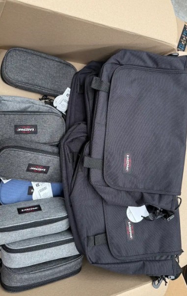 Assorted Box of Eastpak Bags/Pencil Case Holder. NB: Items may not be in or