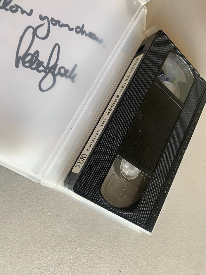 Signed and inscribed original Peter Brock - The Legend VHS tape - CK COA