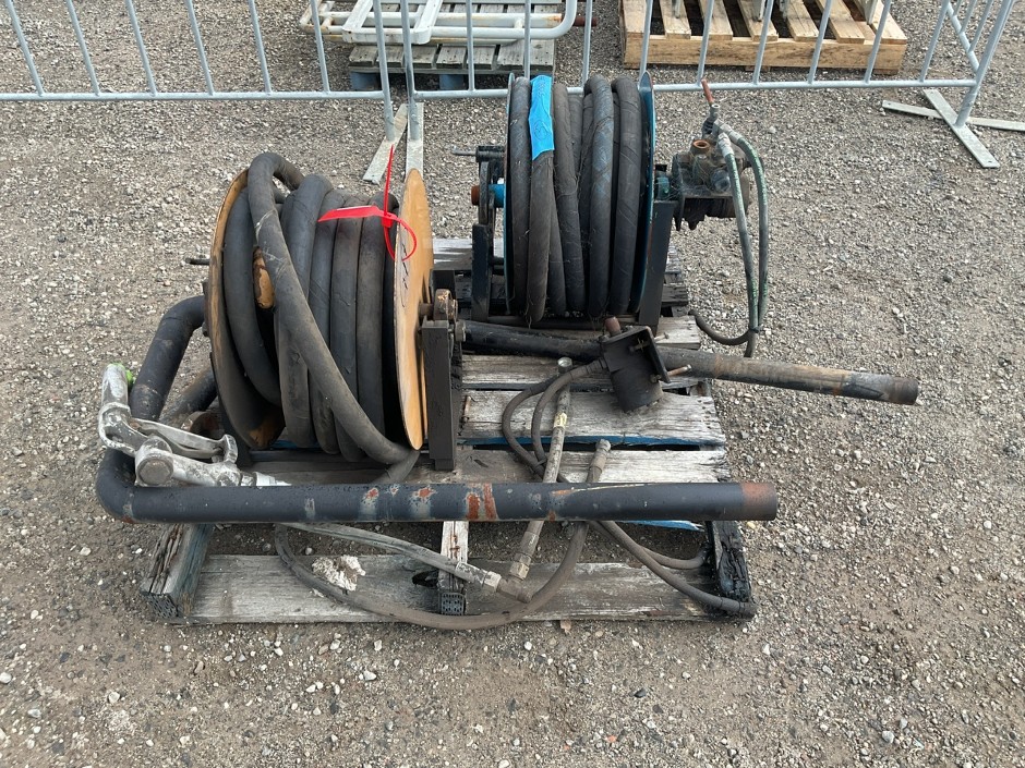 2 x Hose Reels with Nozzles.