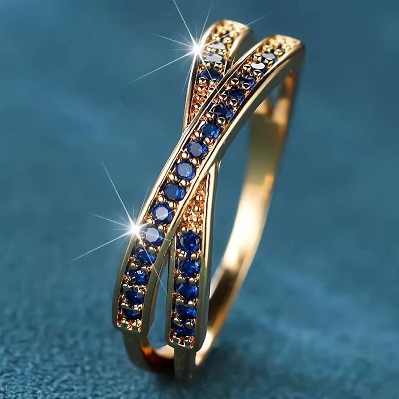 Designer Blue Simulated Diamond Crossover Ring in Yellow - US Size 8