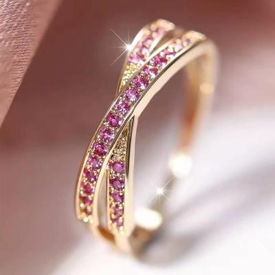 Designer Pink Simulated Diamond Crossover Ring in Gold - US Size 9