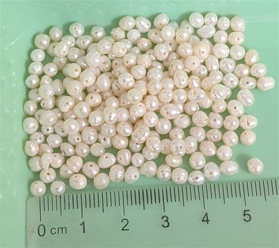 84 carats drilled Freshwater Pearls