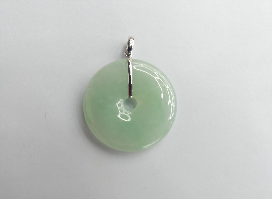 Light Green Jadeite Donut Pendant With Silver Tone Metal Bale