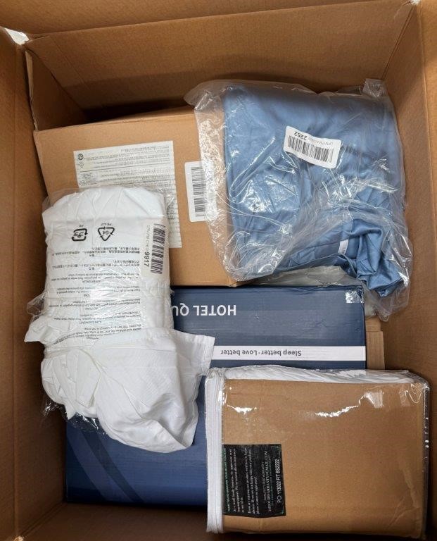 Assorted Box of Bedding incl: Sheets, Quilts and more.  NB: Items may not b