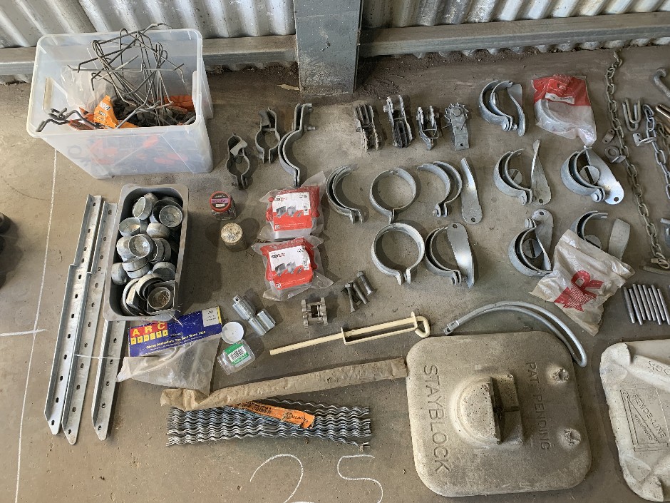 Assorted security fence brackets and bolts