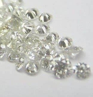 0.25 TCW white various round diamonds